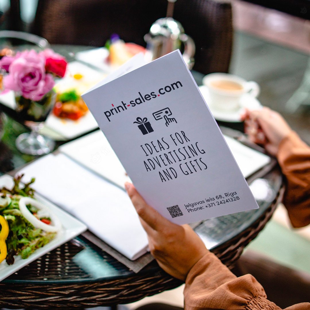 An image showcasing a beautifully designed and printed menu created by Print-Sales.com, featuring appetizing food and drink options in an aesthetically pleasing layout.
